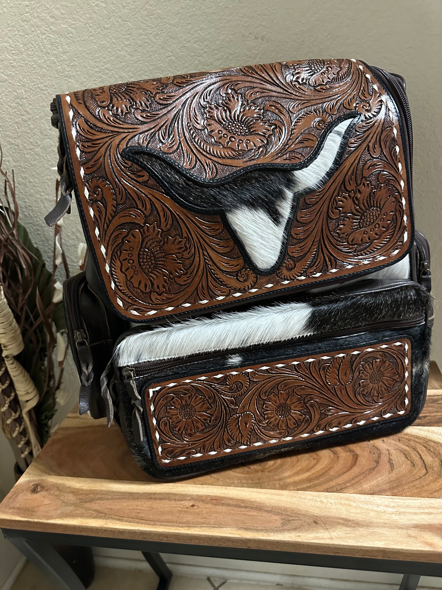 Longhorn Cowhide and tooled backpacks