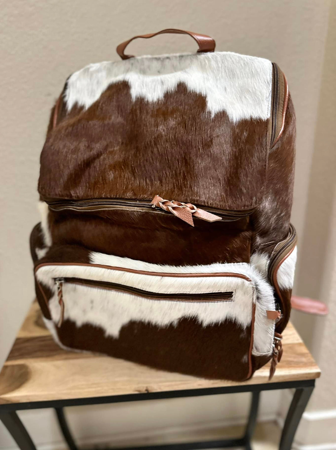 Cowhide backpack Ironing Board Productions