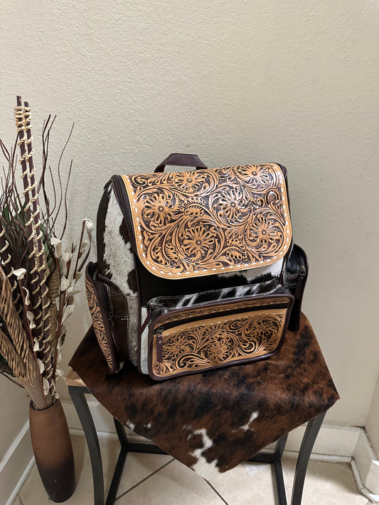 Tooled and cowhide backpack