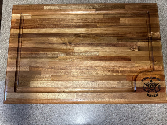 Butcher block style cutting board with custom laser engraving