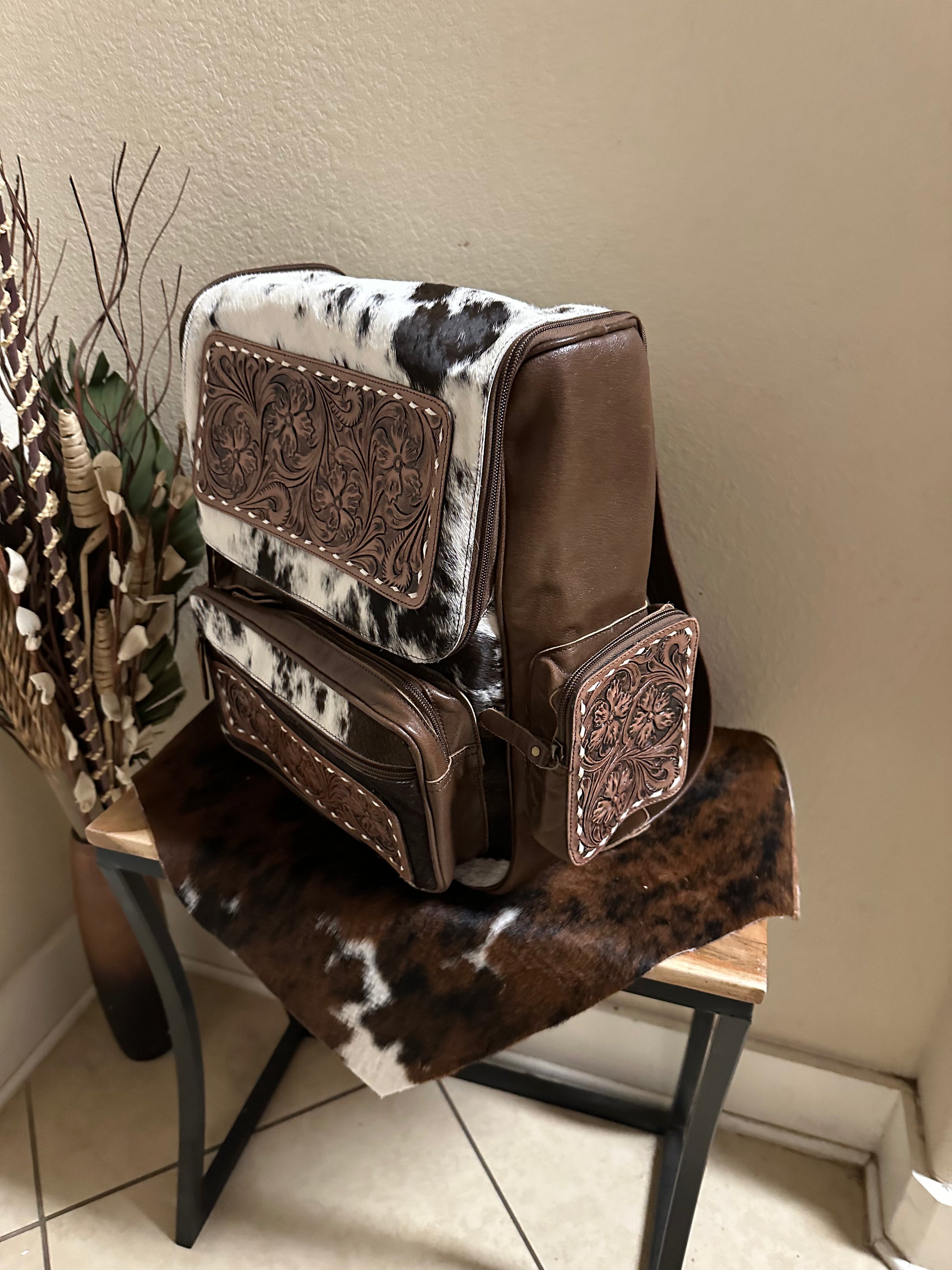 Tooled leather and black/white cowhide Ironing Board Productions